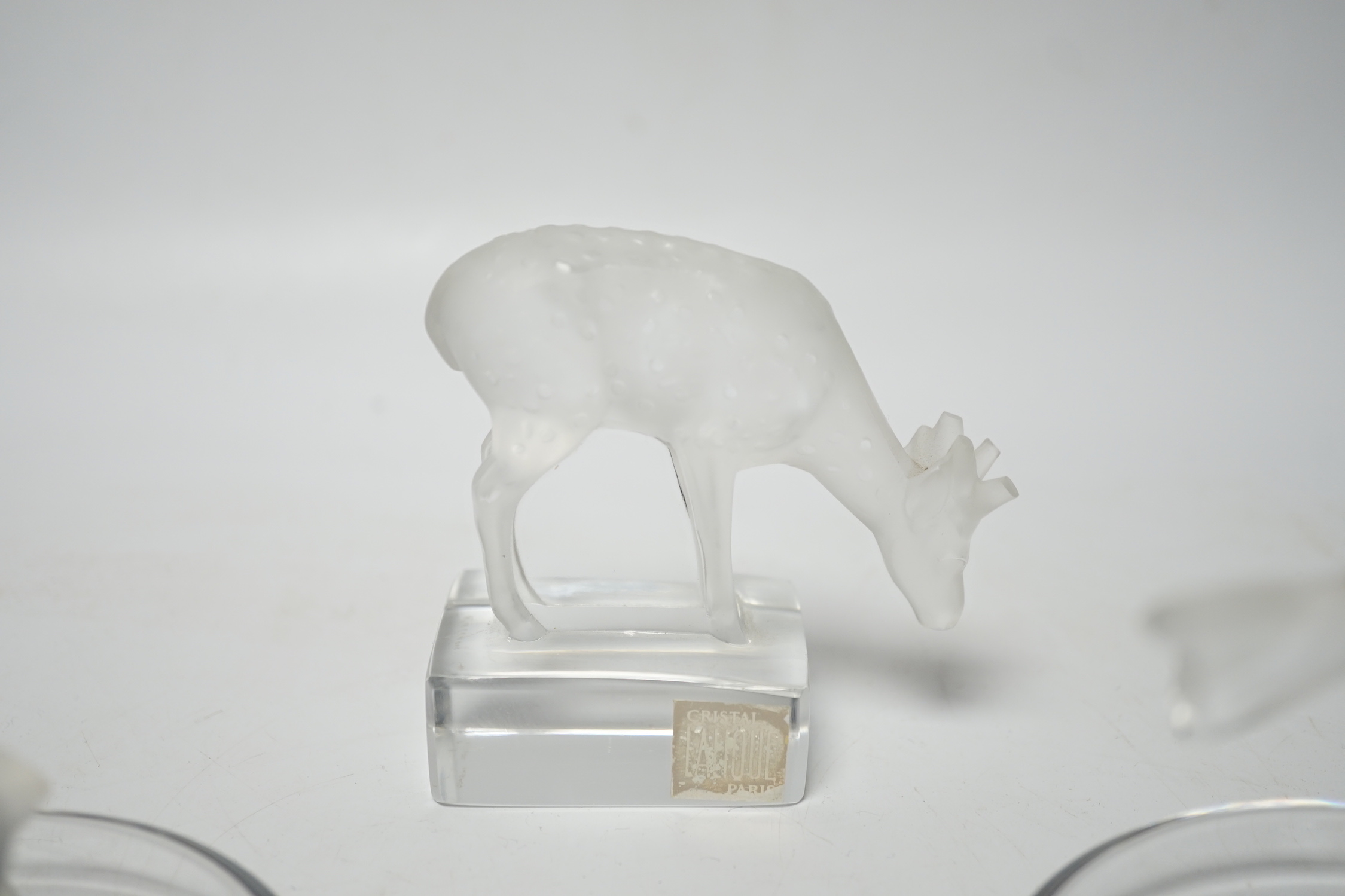 Rene Lalique - two glass pin dishes modelled as a swan and a fish together with a paperweight modelled as a giraffe, signed ‘Lalique France’ to base, tallest 9.5cm high (3)